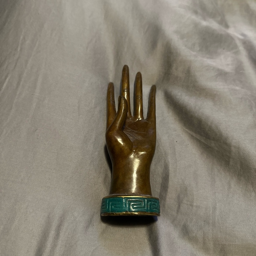 Elegant Bronze Hand Sculpture with Teal Accents
